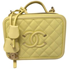 chanel yellow vanity case bag