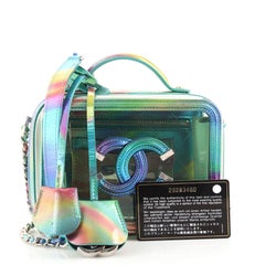 Petit coffret de toilette en PVC filigrane Chanel avec cuir d'agneau