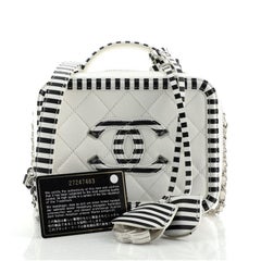 Chanel Vanity Case filigrane matelassé caviar avec cuir rayé petit modèle