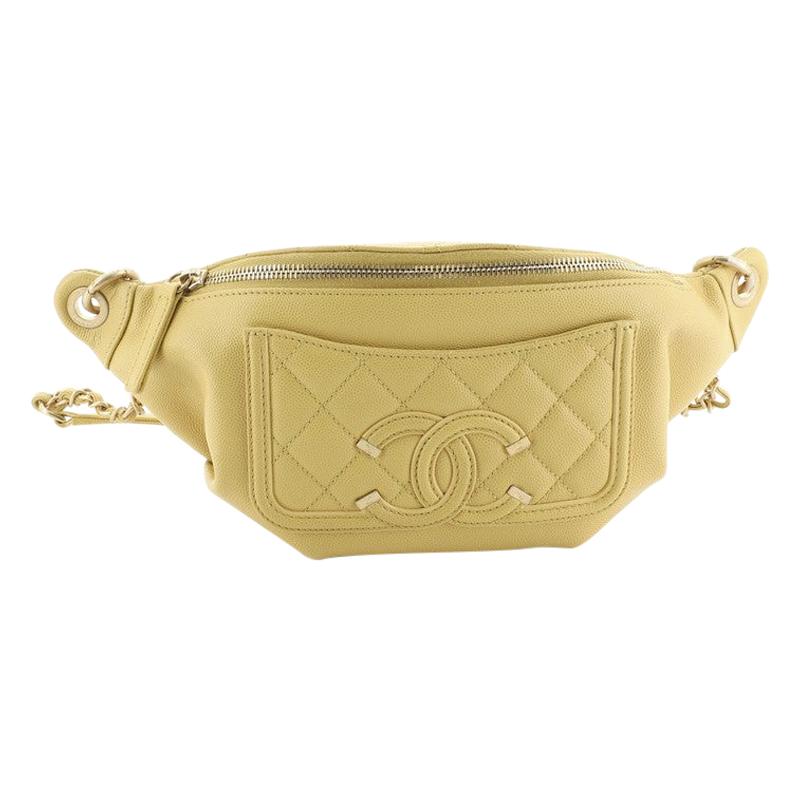 CHANEL Caviar Quilted Filigree Waist Bag Yellow 1204151