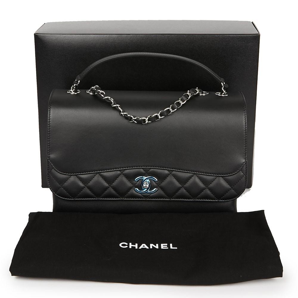 CHANEL Flap Bag in Black Smooth and Quilted Leather 6