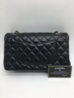 Chanel Flap Bag medium in Black with silver