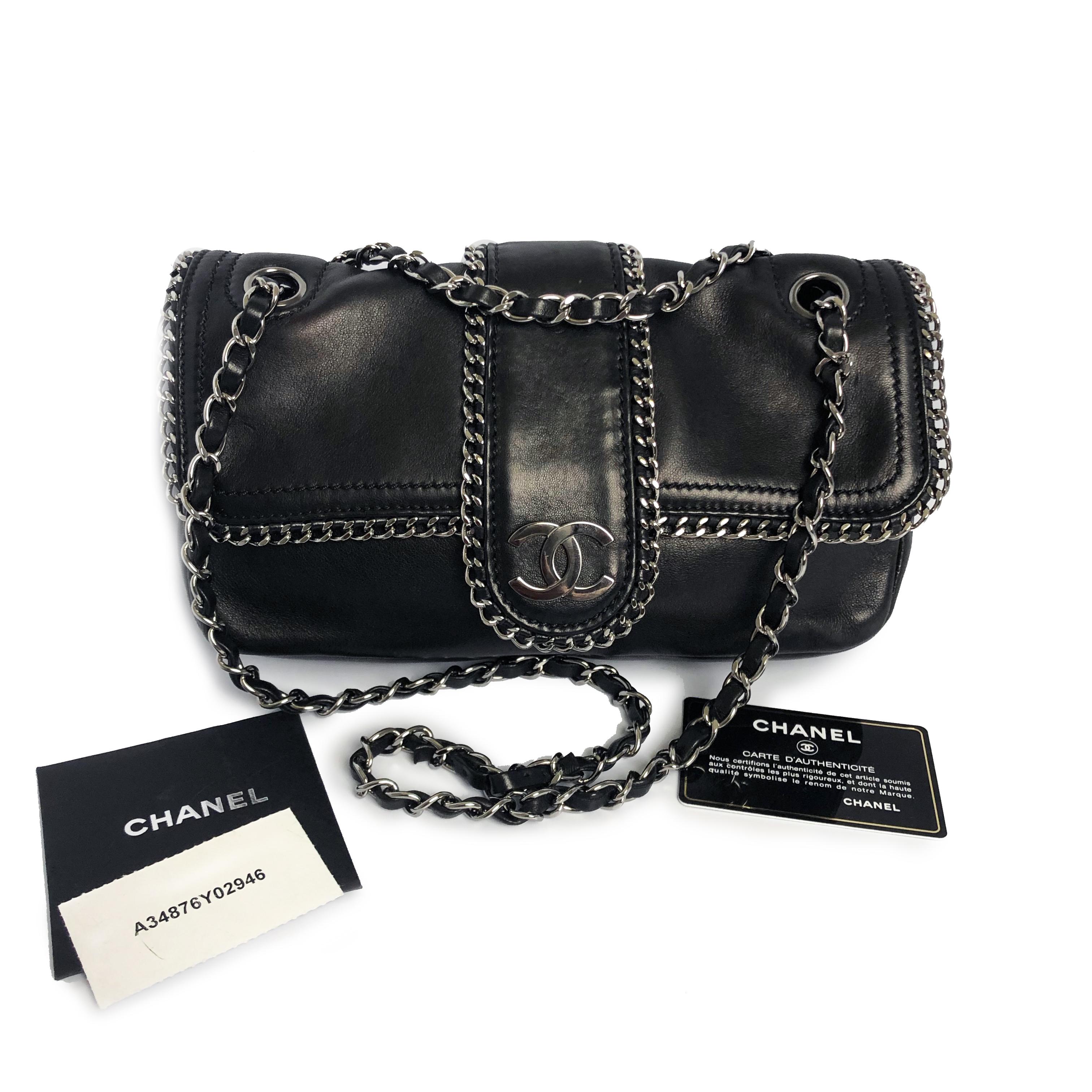 Authentic, preowned Chanel black lambskin leather Madison Chain Me flap bag from 2008. Supple lambskin leather exterior with silver hardware. Interior lined in quilted fabric with 1 zip pocket. Comes with dust bag, care pamphlet & card. Preowned