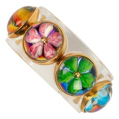 Chanel Pulsera "Flor" de baquelita, cristal y metal dorado, años 90