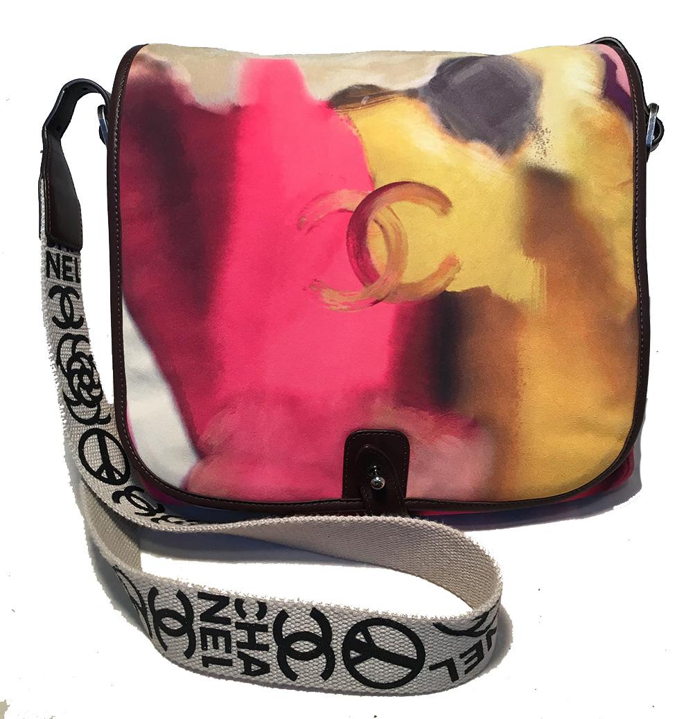 Chanel Flower Power Messenger Multicolor Nubuck Crossbody Shoulder Bag in excellent condition. Painted nubuck exterior in pinks, white, yellows, grays, and purples trimmed with brown leather edges and silver hardware. Woven canvas adjustable