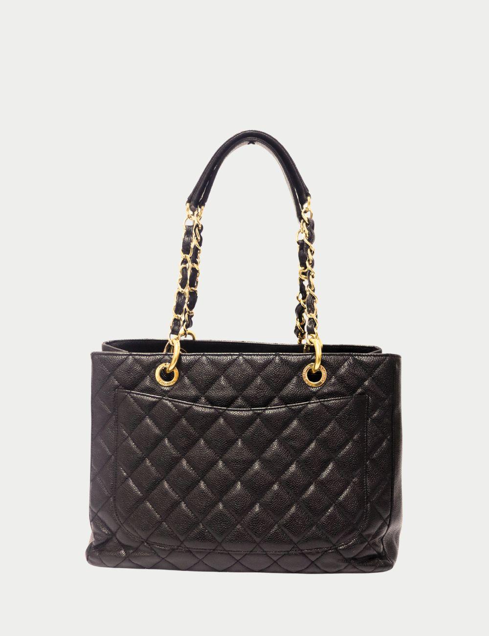 Chanel Black Caviar Leather Quilted Tote Bag

Classic elegance meets everyday functionality in this Chanel Black Caviar Leather Quilted Tote Bag. Crafted from Chanel’s signature durable caviar grained calfskin, the bag features the iconic diamond