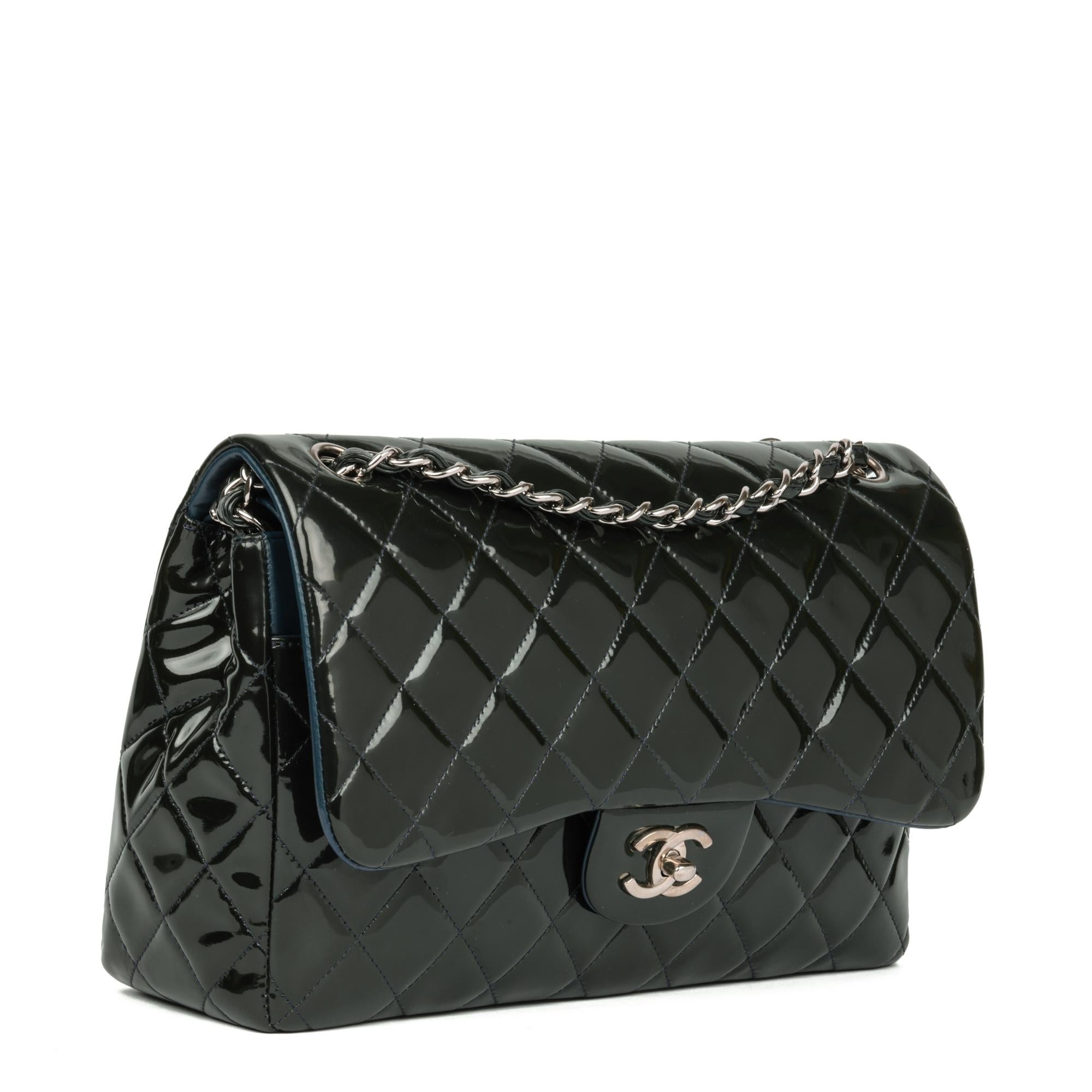 CHANEL
Forest Green Quilted Patent Leather Verso Classic Double Flap Bag

Serial Number: 18327433
Age (Circa): 2013
Accompanied By: Chanel Dust Bag, Box, Protective Felt, Authenticity Card
Authenticity Details: Authenticity Card, Serial Sticker