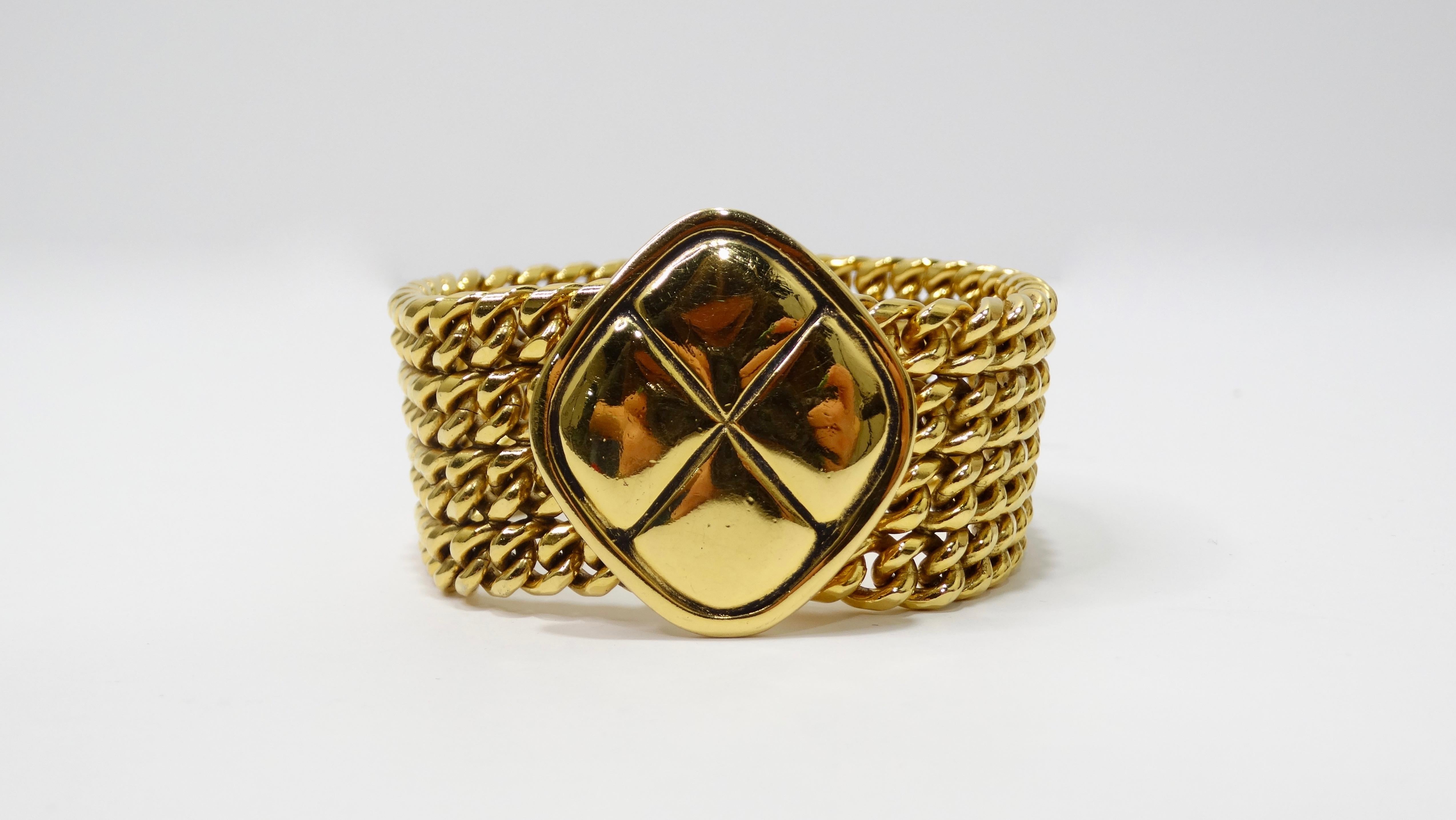 Stay lucky with this timeless Chanel bracelet! Circa 1970s, this gold toned multi-chain bracelet features a four leaf clover pendant with a hook and eye closure. Chanel was very superstitious and she often surrounded herself with lucky charms and