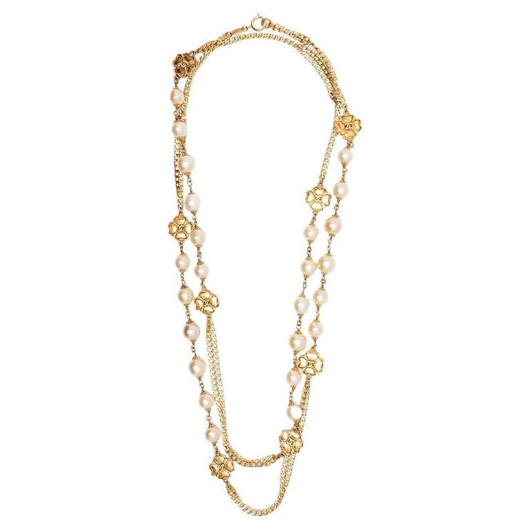 CHANEL Long Pearl Necklace Clover CC - Timeless Luxuries