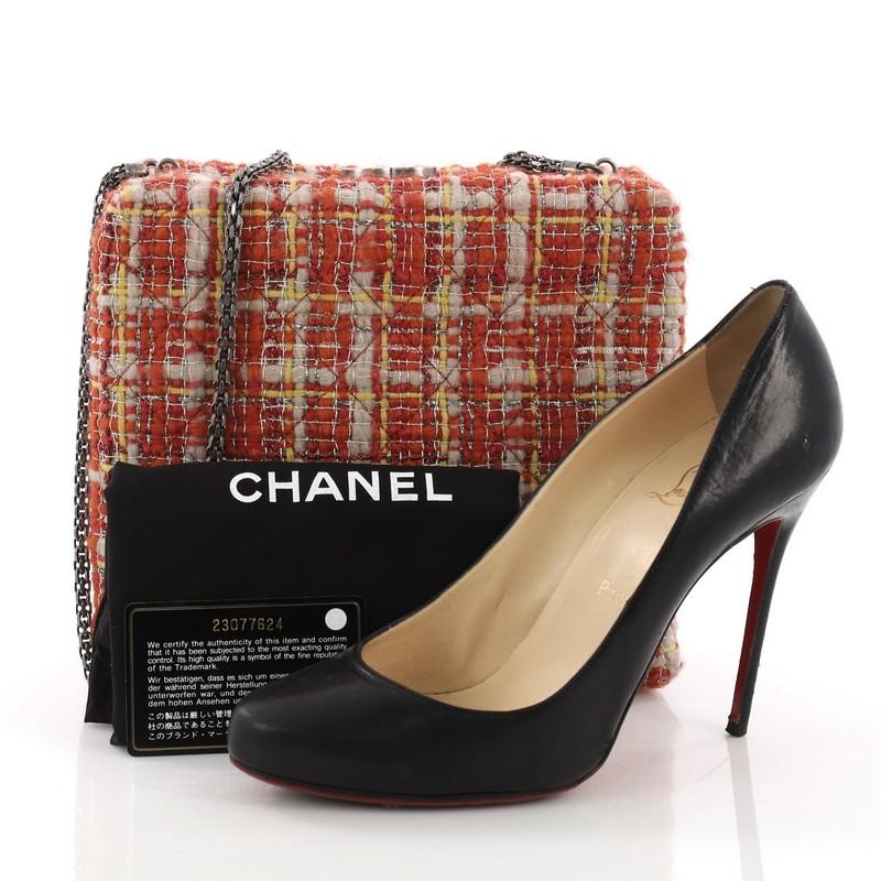 This Chanel Frame Evening Bag Tweed Small, crafted from red tweed, features a chain link strap, framed silhouette, and aged silver-tone hardware. Its CC clasp closure opens to a red leather interior. Hologram sticker reads: 23077624. **Note: Shoe