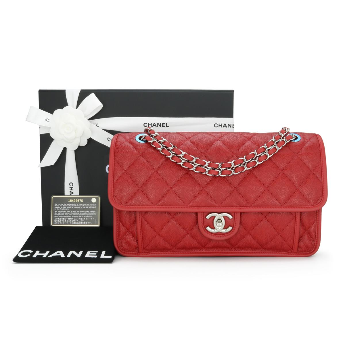 CHANEL French Riviera Flap Bag in Red Caviar with Silver-Tone Hardware 2013 - 13B.

This stunning bag is in immaculate condition; it still holds its original shape, and the hardware is still very shiny.

It is a super practical lightweight bag that