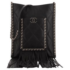 Chanel - Sac de shopping plat à franges en cuir de veau matelassé petit modèle