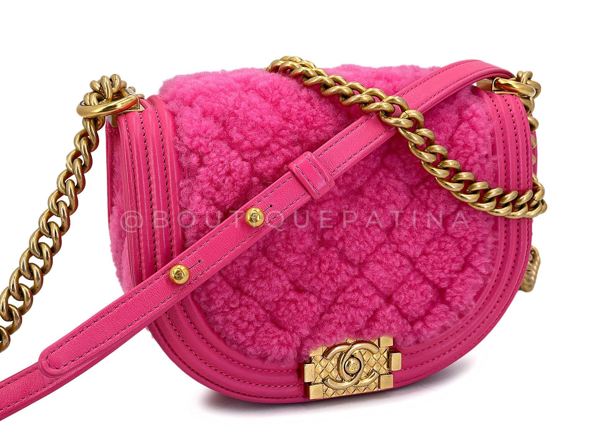 Store item: 67885
This Chanel Fuchsia Pink Shearling Round Boy Flap Bag GHW is super whimsical and yummy with a fuchsia pink shearling fur that is cozy and chic at the same time.

In Pink shearling and brushed gold hardware. A feminine twist on the