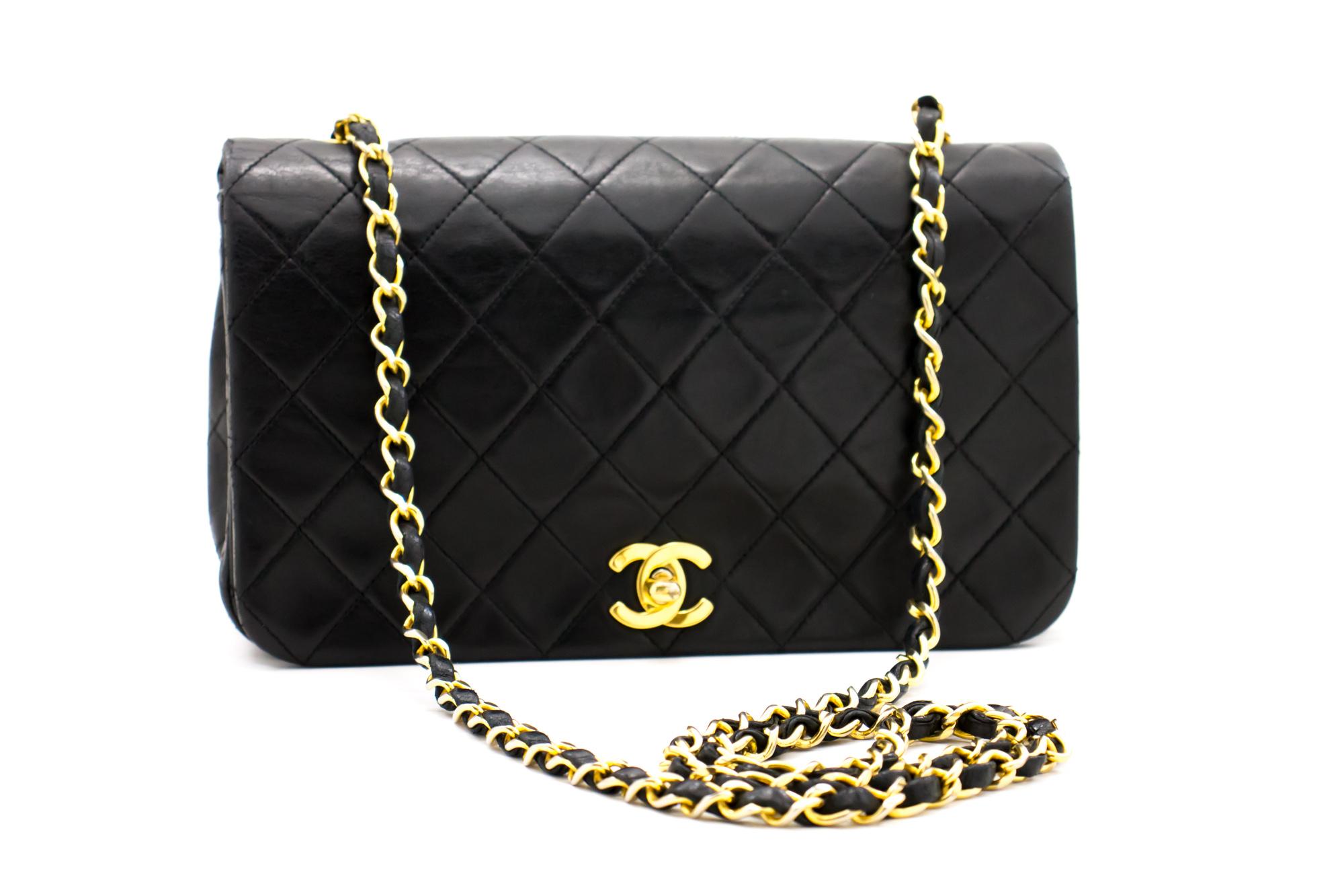 An authentic CHANEL Full Flap Chain Shoulder Bag Crossbody Black Quilted Lamb. The color is Black. The outside material is Leather. The pattern is Solid. This item is Vintage / Classic. The year of manufacture would be 1989-1991.
Conditions &