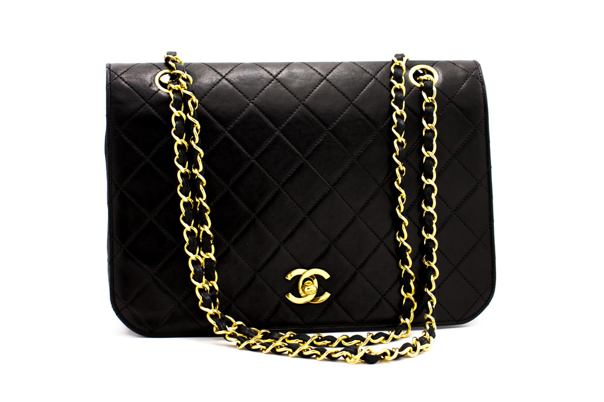 An authentic CHANEL Full Flap Vintage Chain Shoulder Bag Black Quilted made of black Lambskin. The color is Black. The outside material is Leather. The pattern is Solid. This item is Vintage / Classic. The year of manufacture would be