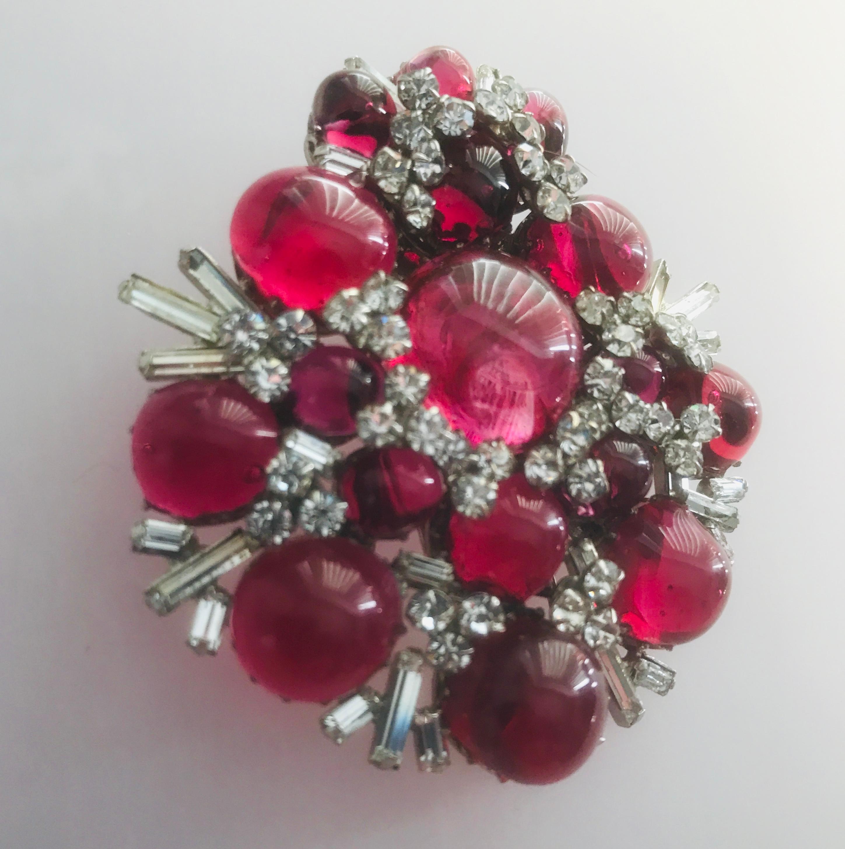 The most sumptuous Fuchsia Red Maison Gripoix fur pin made for Chanel in the 1930’s.

The colour of these red pate de verre Gripoix glass cabochons is just so rich and vibrant.

The condition is excellent with no loss or damage to the Gripoix