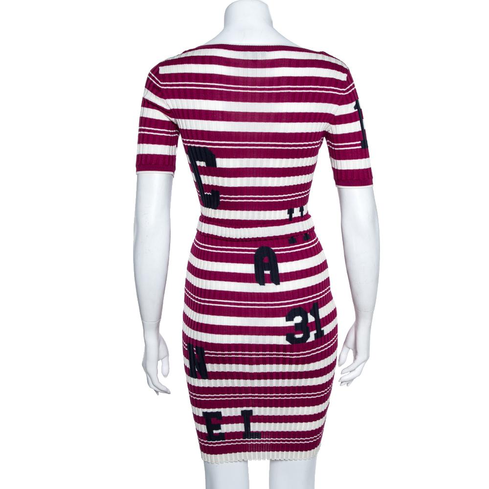 Creations from Chanel are high in quality, style, and class. This dress is an effortlessly modish piece that needs no effort to sport from desk to drinks. It exudes a modern vibe having been designed with a striped pattern all over along and CHANEL