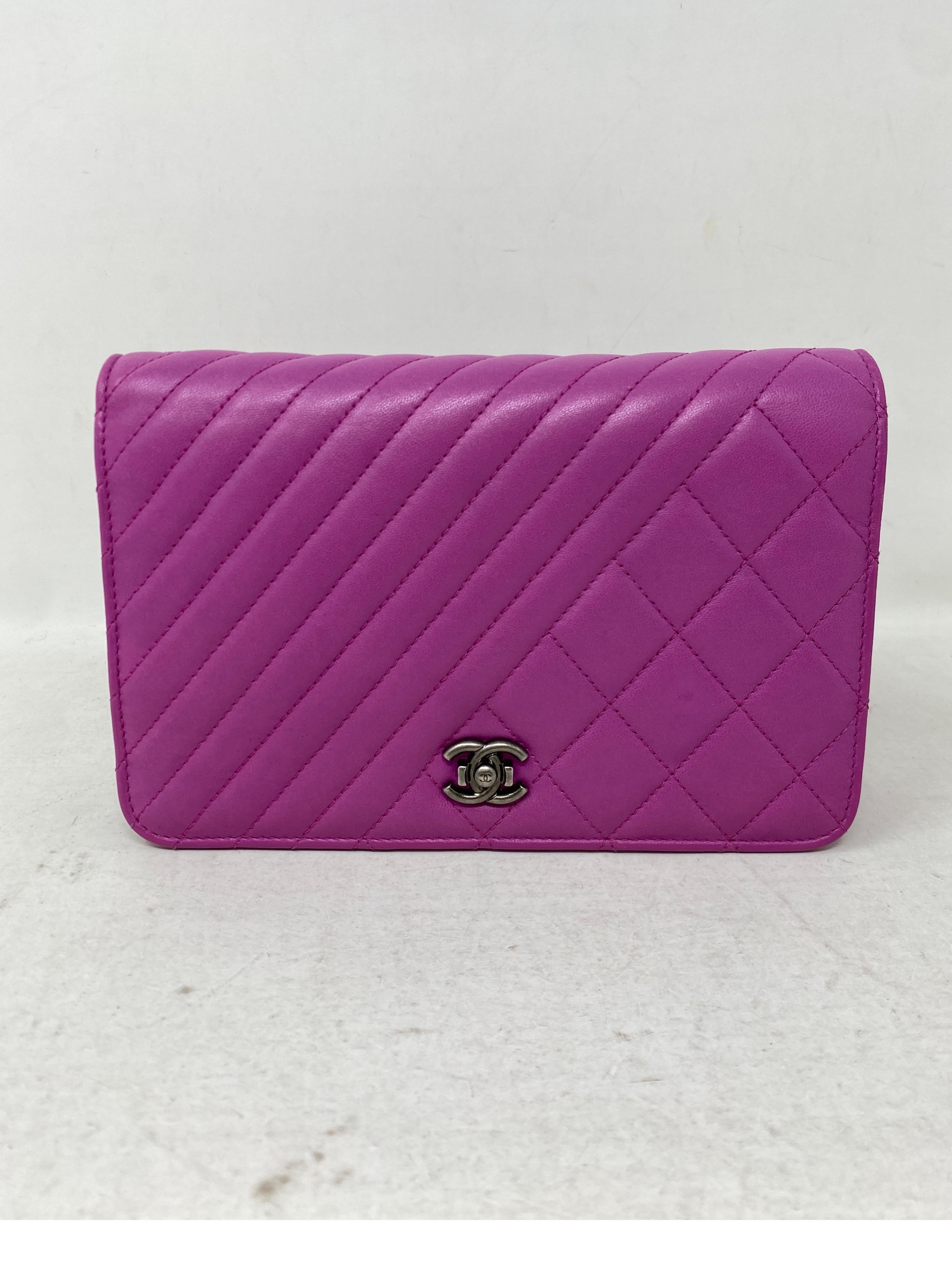 Chanel Fuschia Wallet On A Chain Bag. Unique style wallet on a chain. Can be worn as a clutch too. Crossbody bag. Ruthenium hardware. Excellent condition. Pretty and vibrant color. Serial number intact inside bag. Guaranteed authentic. 