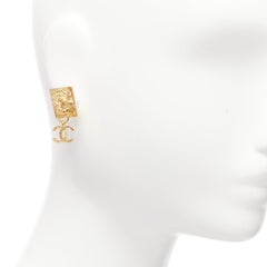 CHANEL G22A gold CC charm Lion Head square stud clip on earrings pair