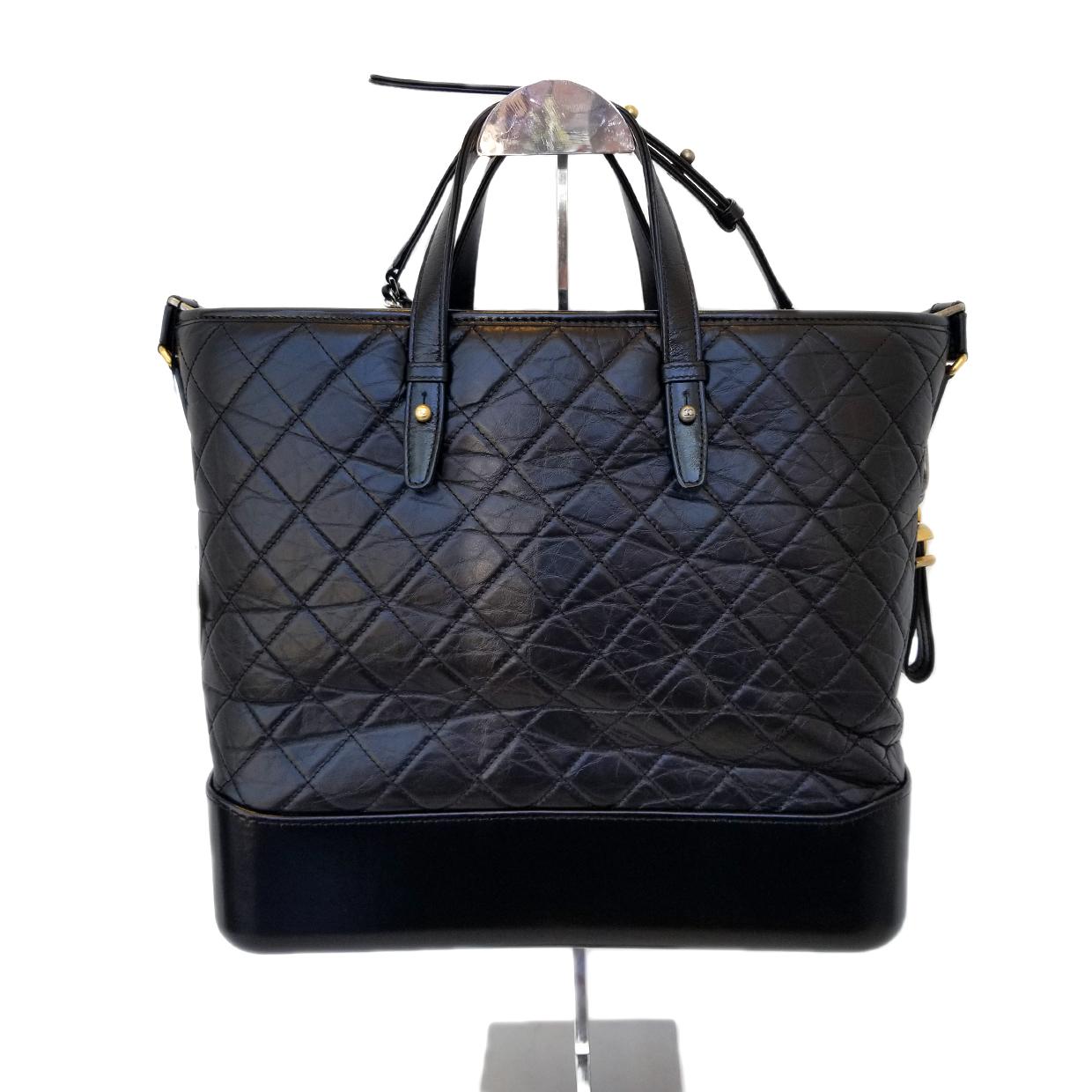 Brand - Chanel
Collection - Gabrielle
Estimated Retail - $4,600.00
Style - Hobo Bag
Material - Calfskin Leather
Color - Black
Pattern - Quilted
Closure - Zip
Hardware Material - Multitonal
Model/Date Code - A93823
Comes With - Box, Dustbag, Designer