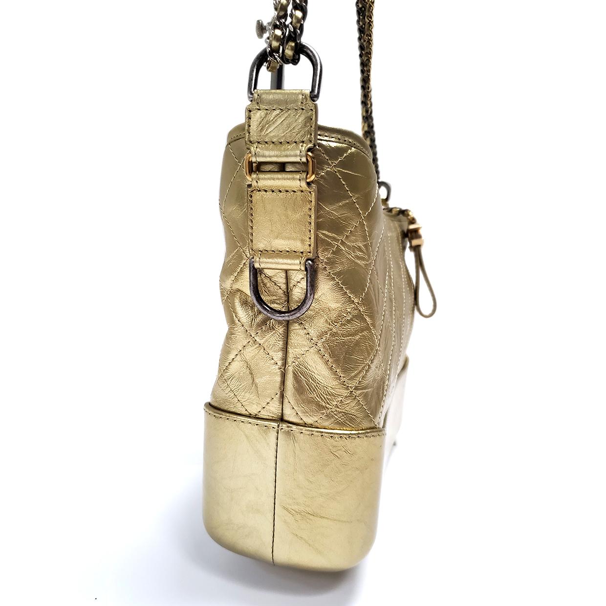Brand - Chanel
Collection - Gabrielle
Estimated Retail - $4,500.00
Style - Hand Bag
Material - Lambskin
Color - Gold
Pattern - Quilted
Closure - Zip
Hardware Material - Goldtone & Silvertone
Model/Date Code - 243***08
Comes With - Box, Dustbag,