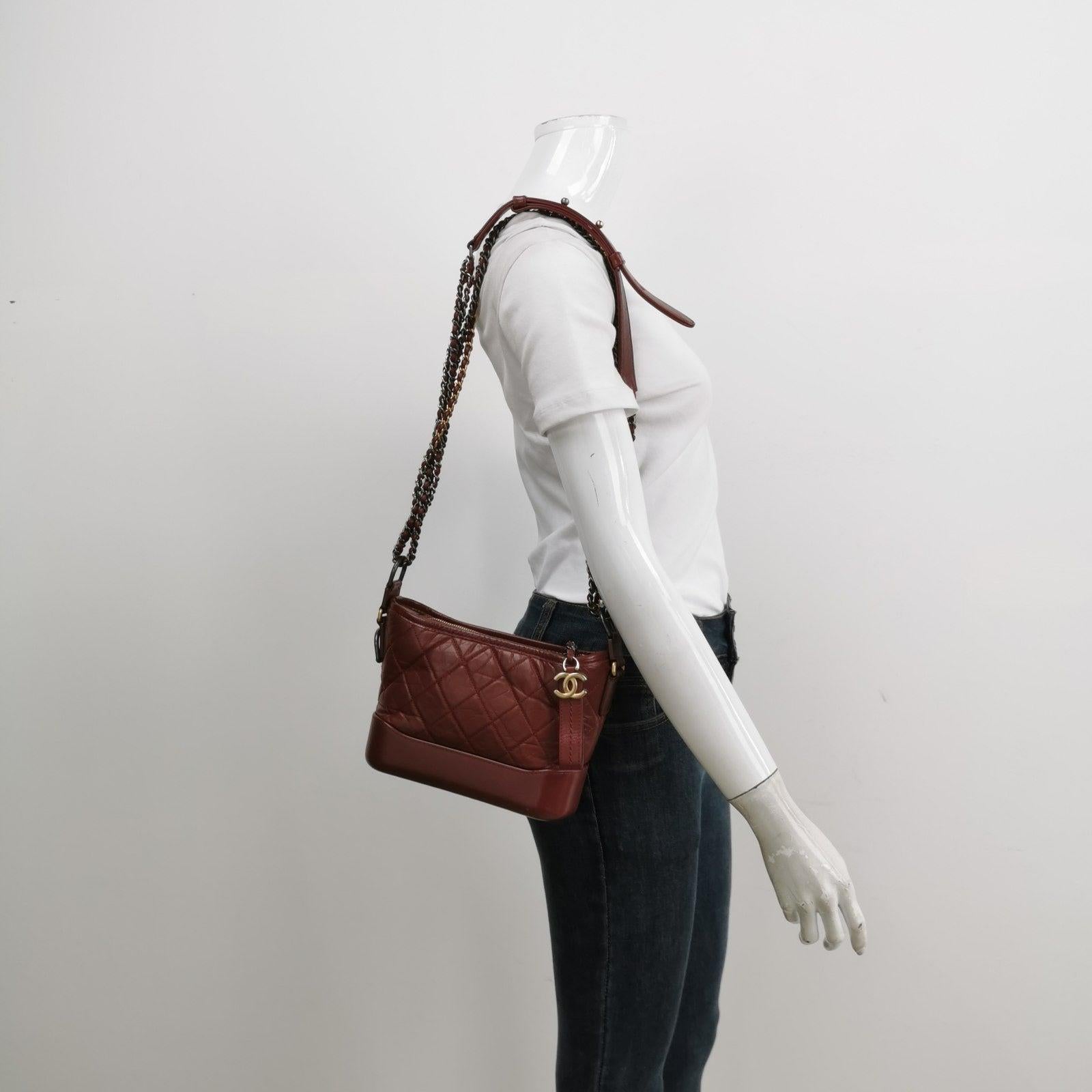 Chanel Gabrielle Hobo 2018 Burgundy Leather Small Crossbody Bag These are professional photos of the actual bag offered by Luxbags. 
 
 CONDITION: EXCELLENT This preloved authentic Chanel Gabrielle bag is in excellent condition with minimal signs of