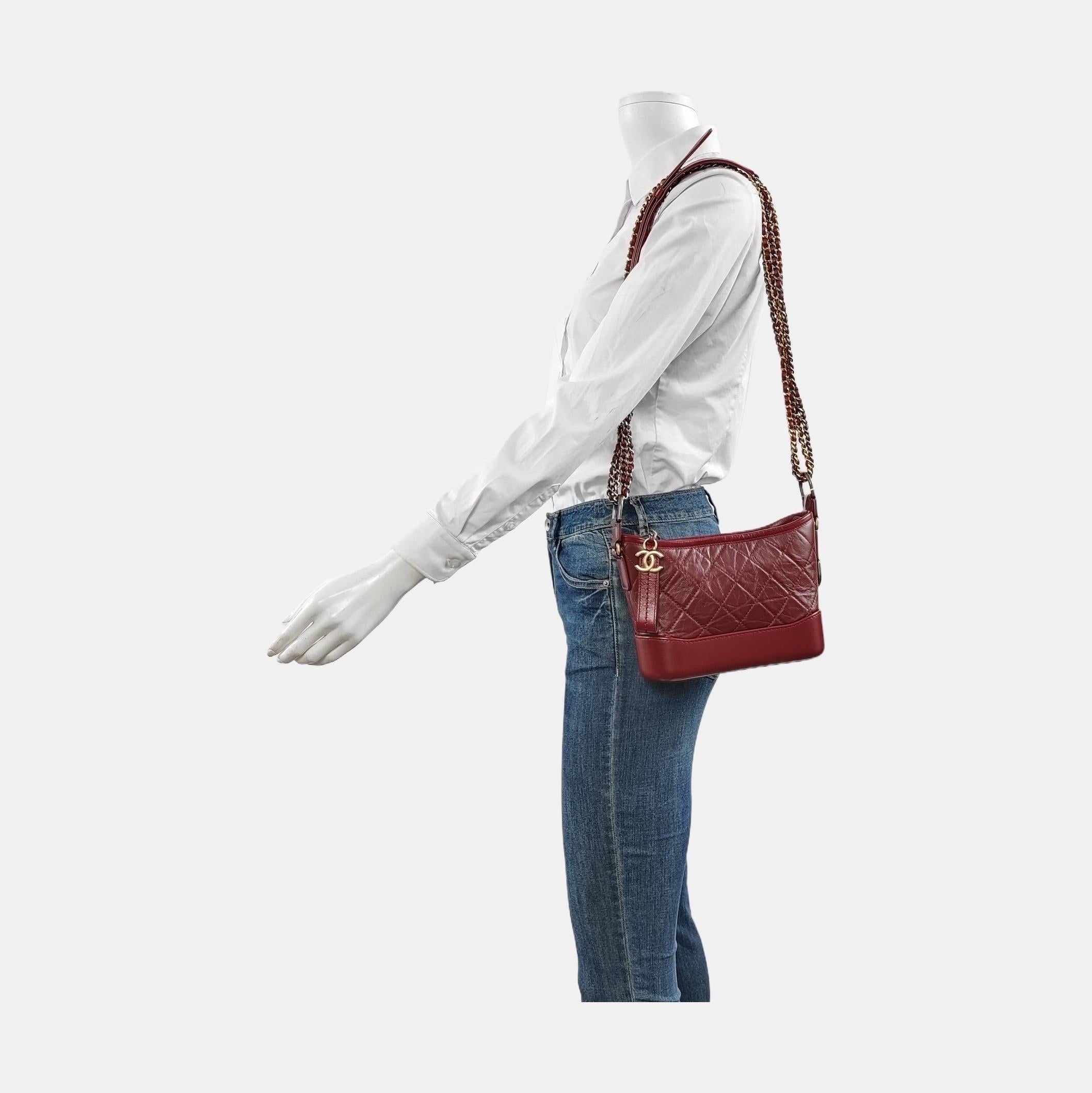 Chanel Gabrielle Hobo 2018 Burgundy Leather Small Crossbody Bag These are professional photos of the actual bag offered by Luxbags. 
 
 CONDITION: EXCELLENT This preloved authentic Chanel Gabrielle bag is in excellent condition with minimal signs of
