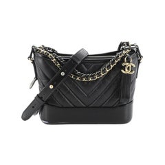 CHANEL Aged Calfskin Chevron Quilted Small Gabrielle Hobo Black |  FASHIONPHILE