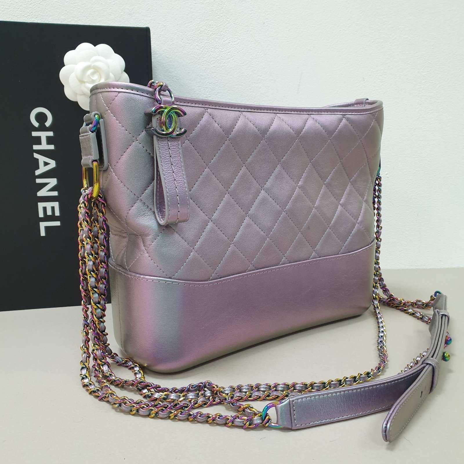Sold Out Everywhere!!

Chanel Gabrielle Rainbow Medium bag crafted in Iridescent calfskin/lambskin and iridescent hardware.

The most sough after bag from Chanel at the moment!

The Gabrielle bag can be worn in multiple ways, also cross body.

This