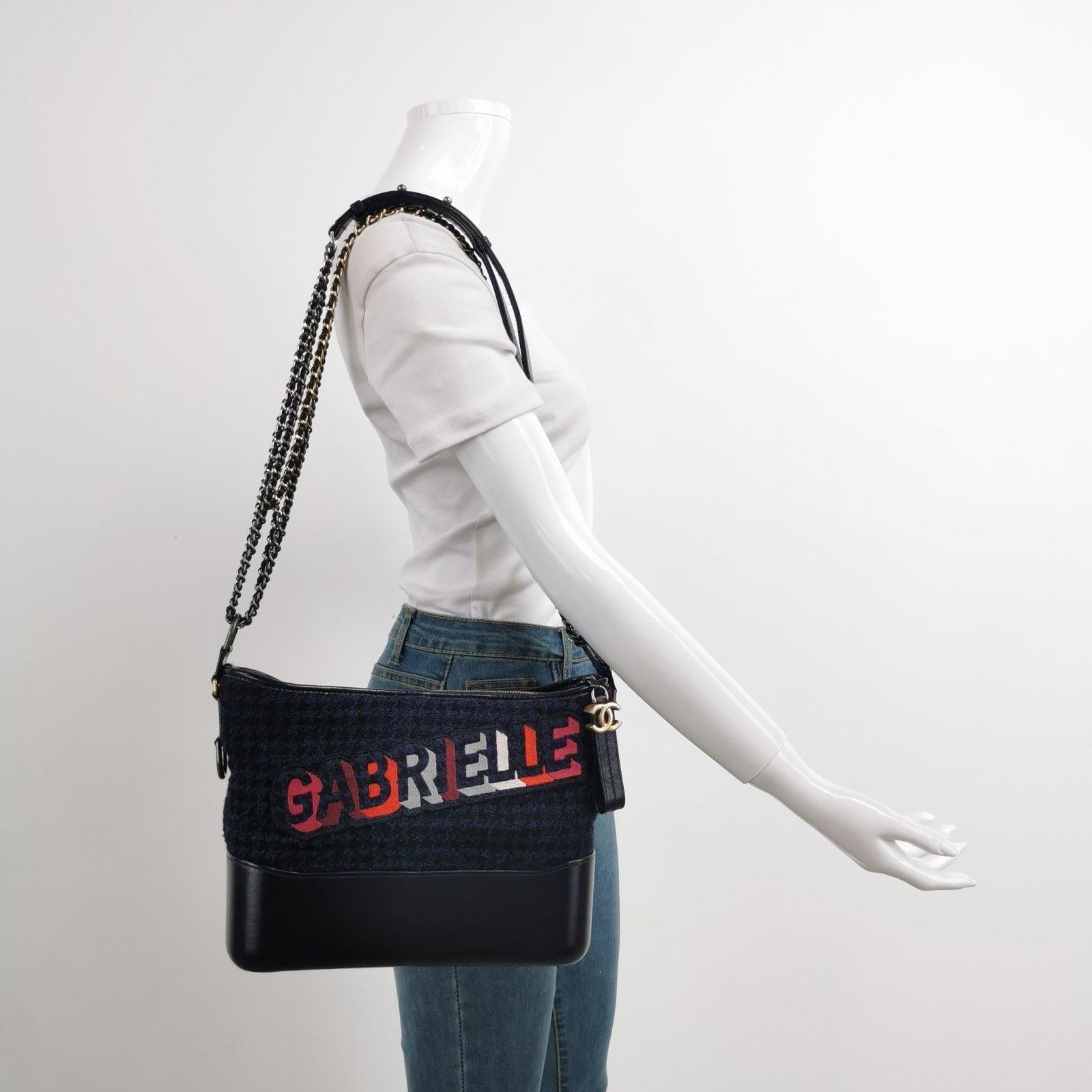 Chanel Gabrielle Logo Hobo Tweed and Calfskin Medium 2017-2018 These are professional photos of the actual bag offered by Luxbags. CONDITION: EXCELLENT This preloved authentic Chanel Gabrielle bag is in excellent condition with minimal signs of use.