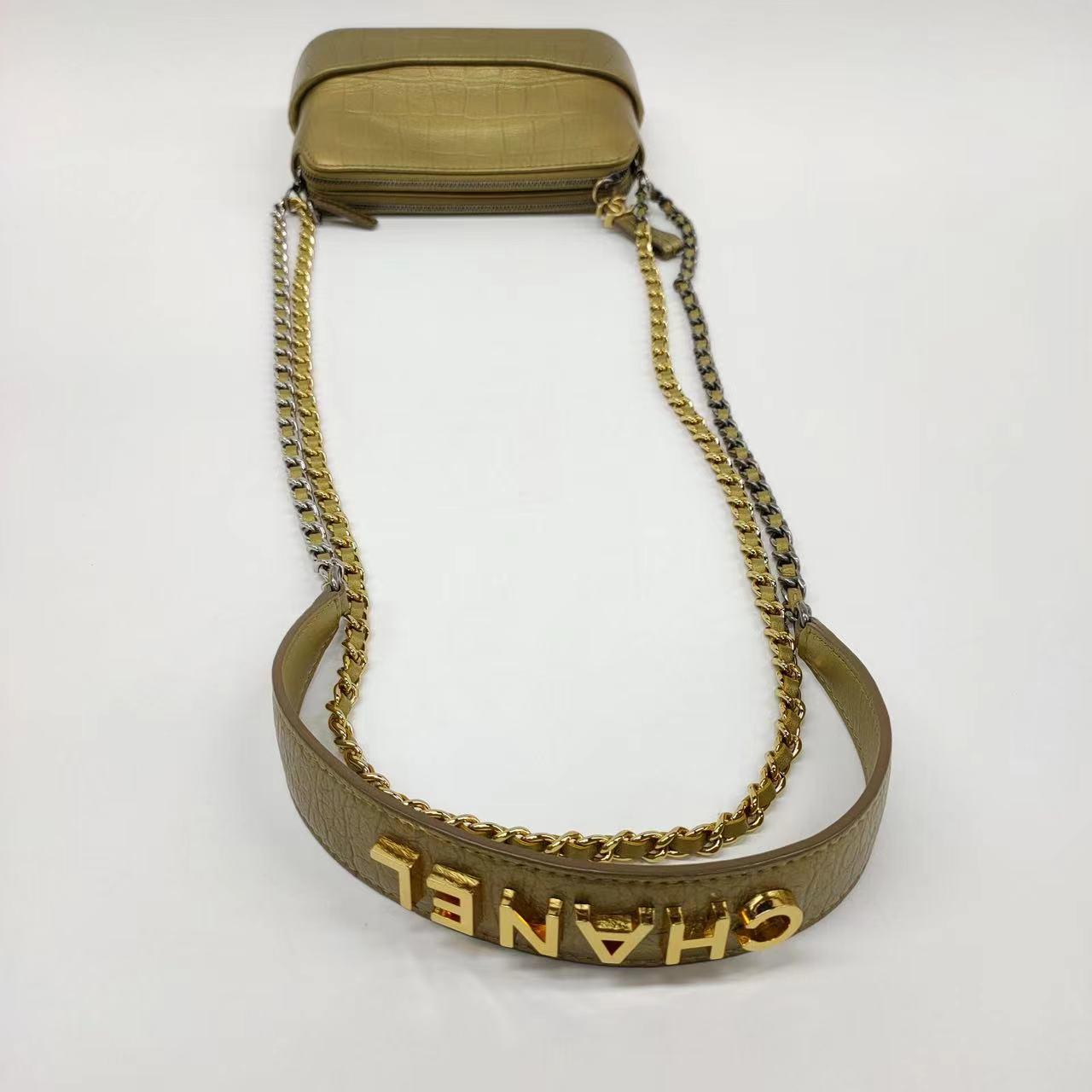 Chanel Gabrielle Mini Gold Crocodile Embossed Calfskin Leather Crossbody Bag
 These are professional photos of the actual bag offered by Luxbags.
 This gorgeous Chanel Gabrielle Mini Gold Crocodile Embossed Calfskin Leather Crossbody Bag is a rarity