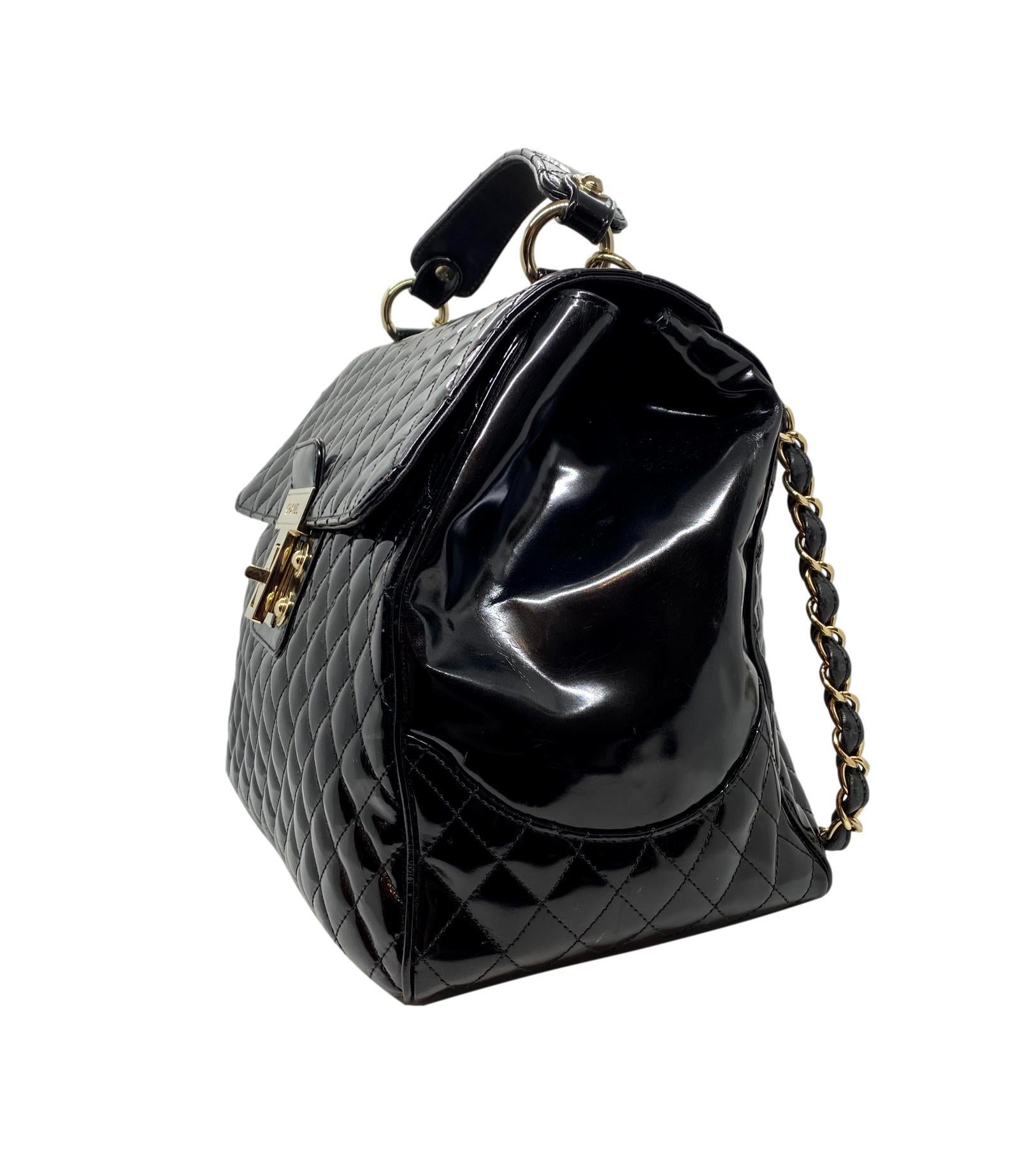 Chanel Glazed Lambskin Quilted Mademoiselle Kelly Top Handle Shoulder Bag, 2009. The iconic Chanel bag was originally issued by Coco Chanel in February 1955 which became the very first socially acceptable shoulder bag for the modern-day woman of