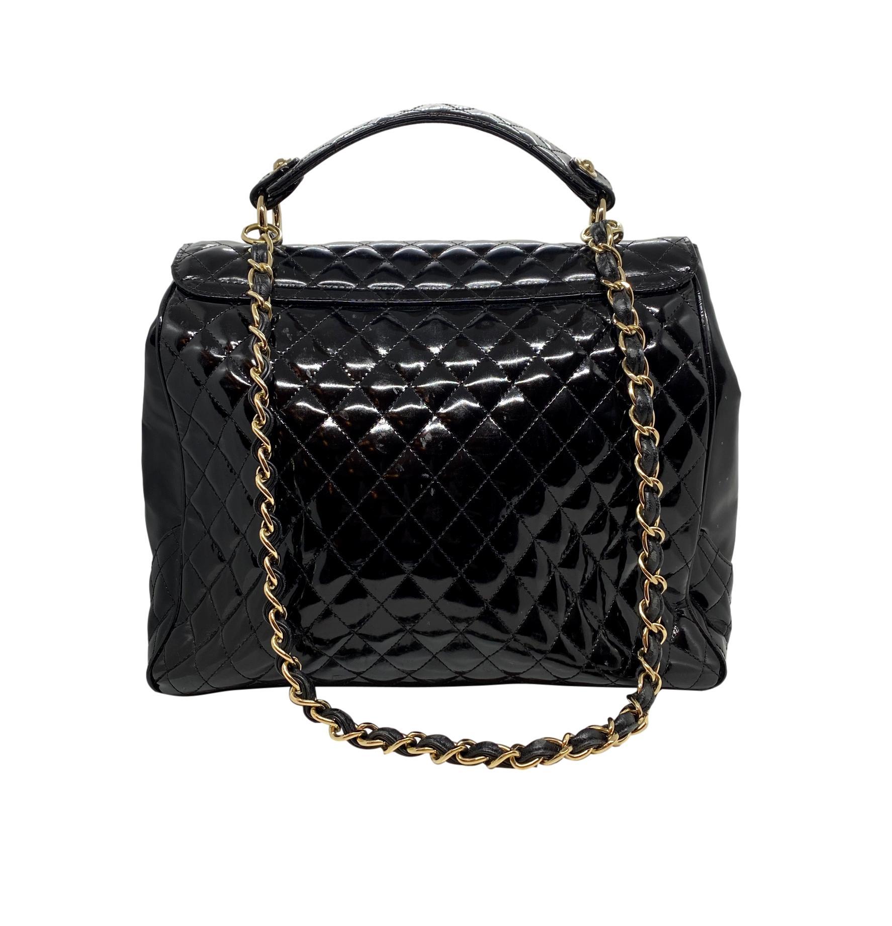 Black Chanel Glazed Lambskin Quilted Mademoiselle Kelly Top Handle Shoulder Bag, 2009.