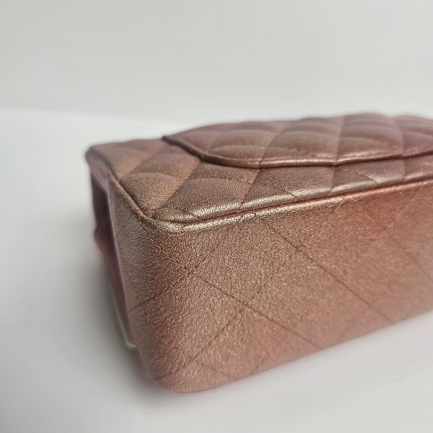 Chanel ombre metallic mini rectangle bag. In barely worn condition, but there are some chipping/rubbing on the corners of the bag. Very sturdy. From more recent collection (series 30). Comes with its holo, card and dust bag. 