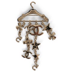 CHANEL gold 23C MONTE CARLO CHARMS HANGER Brooch