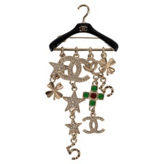 CHANEL gold 23C MONTE CARLO CHARMS HANGER Brooch