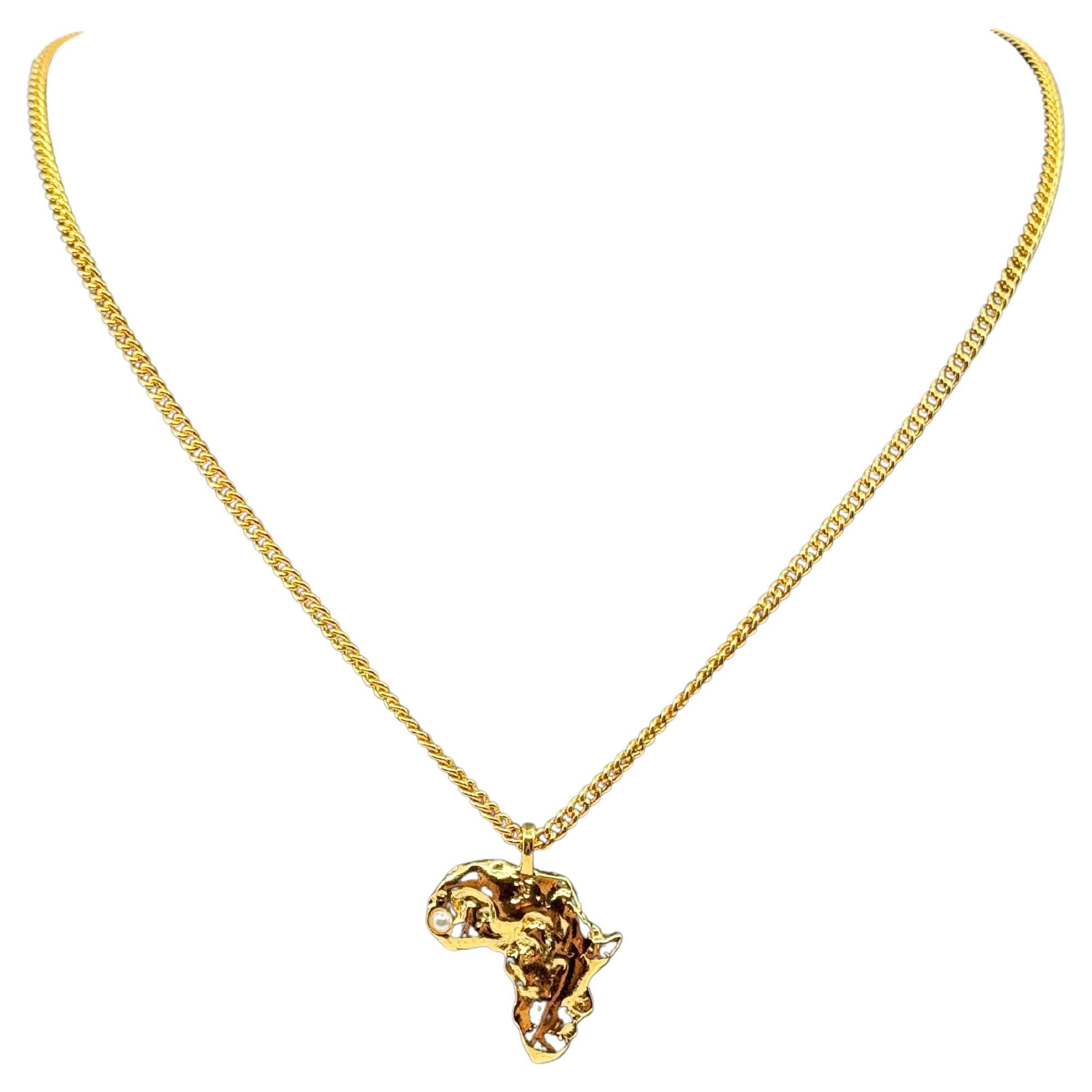 CHANEL Gold Africa Map Crystal CC Pendant Necklace For Sale