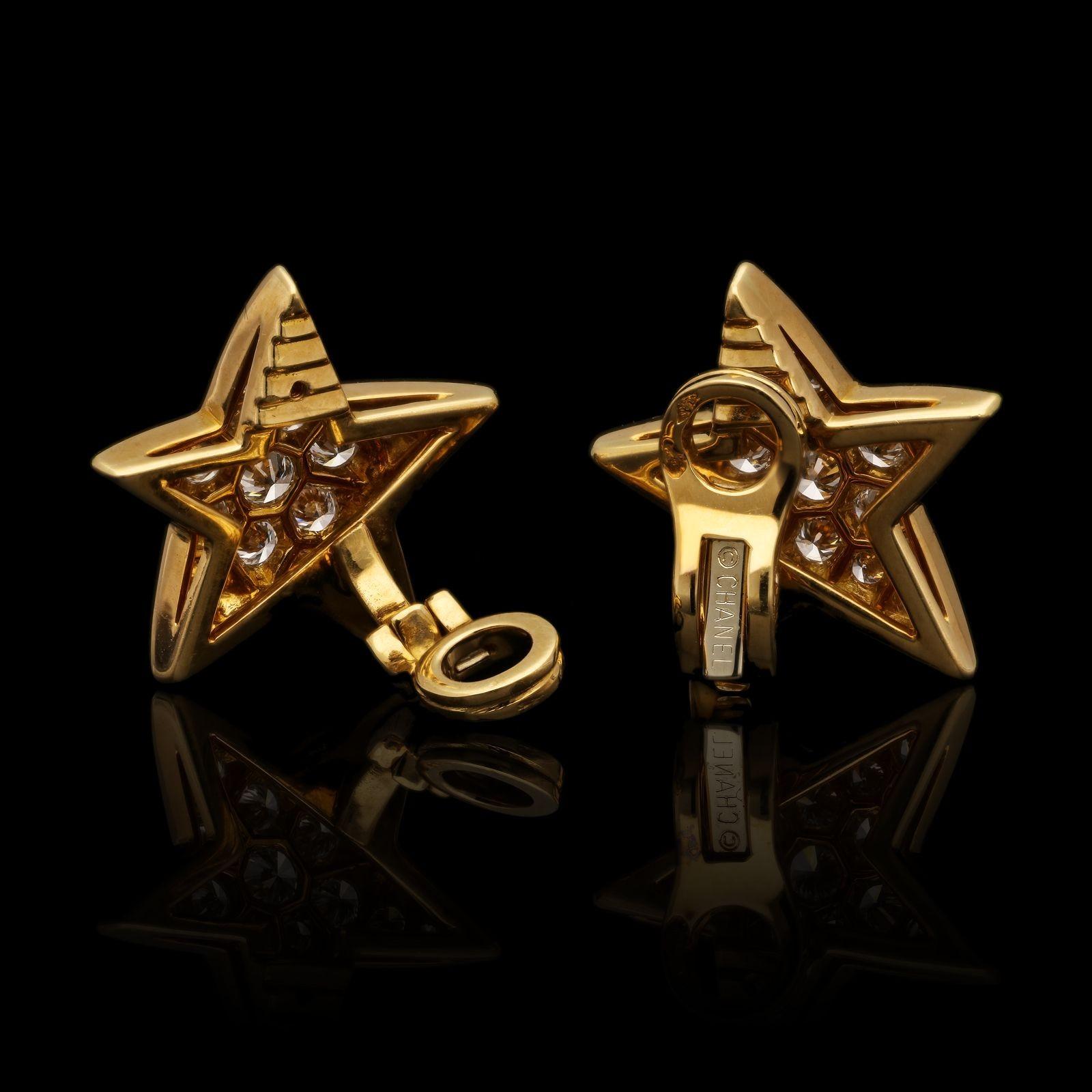 A lovely pair of gold and diamond star earrings by Chanel c.2015 from the Comète Collection, each designed as an asymmetric five pointed star in 18ct yellow gold with a gently domed profile and pavé set throughout with round brilliant cut diamonds