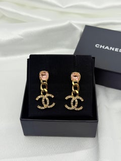 CHANEL Gold and Pink Crystal CC Chain Dangle Earrings