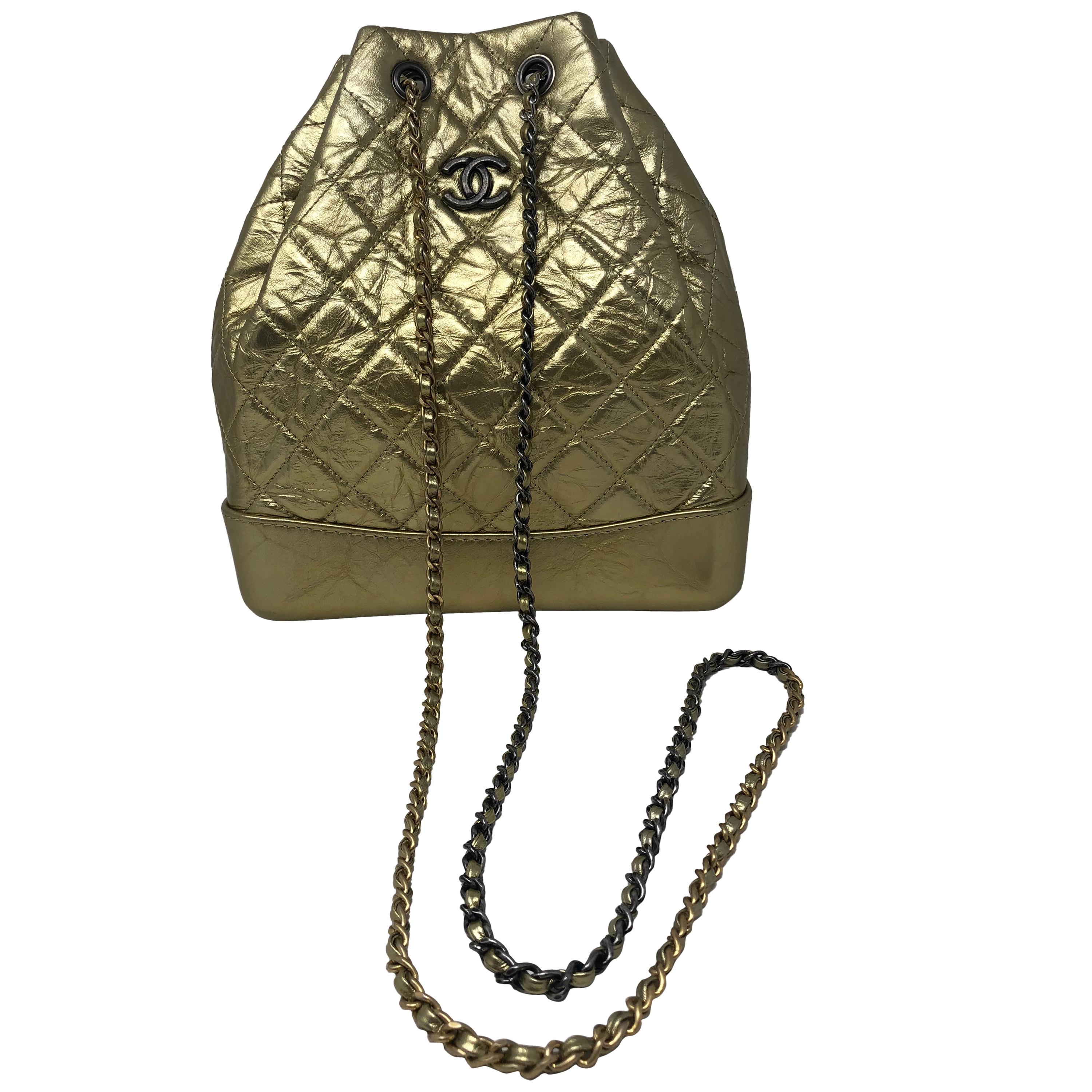 chanel gold backpack