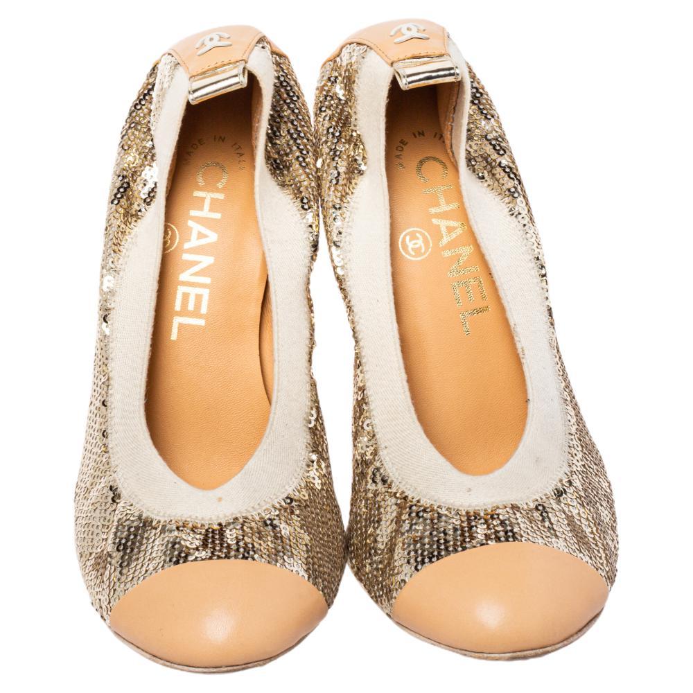 Chanel's timeless aesthetic and stellar craftsmanship in shoemaking is evident in these stunning pumps. Crafted from leather in a beige shade, these pumps are detailed with sequins, round toes, block heels, and CC logos.

Includes: Original Dustbag,