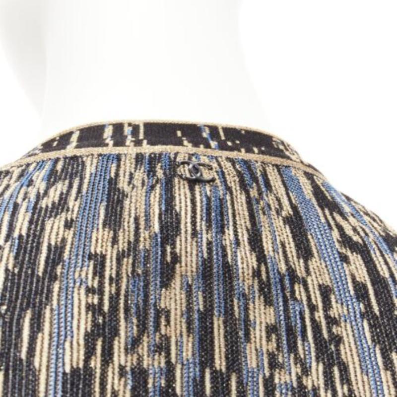 CHANEL gold black blue metallic lurex long cardigan sweaer FR38 M
Reference: NKLL/A00009
Brand: Chanel
Designer: Karl Lagerfeld
Material: Rayon, Blend
Color: Gold, Black
Pattern: Abstract
Closure: Button
Extra Details: Back CC logo at nape.