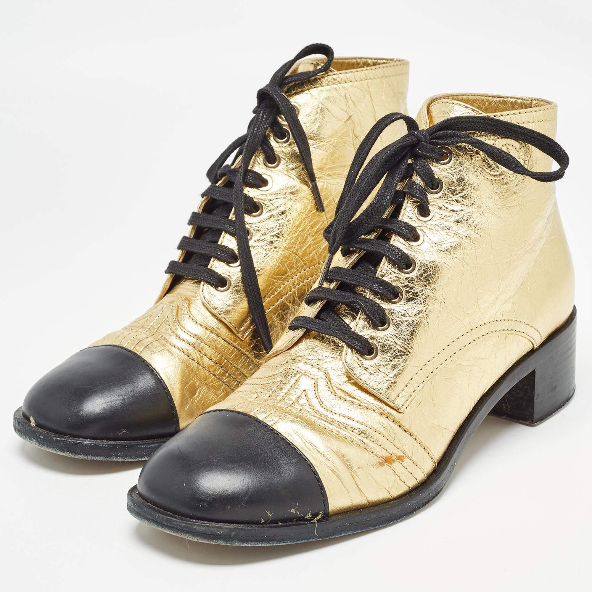 Make a statement with these Chanel ankle boots for women. Impeccably crafted these chic gold boots offer both fashion and comfort elevating your look with each graceful step.