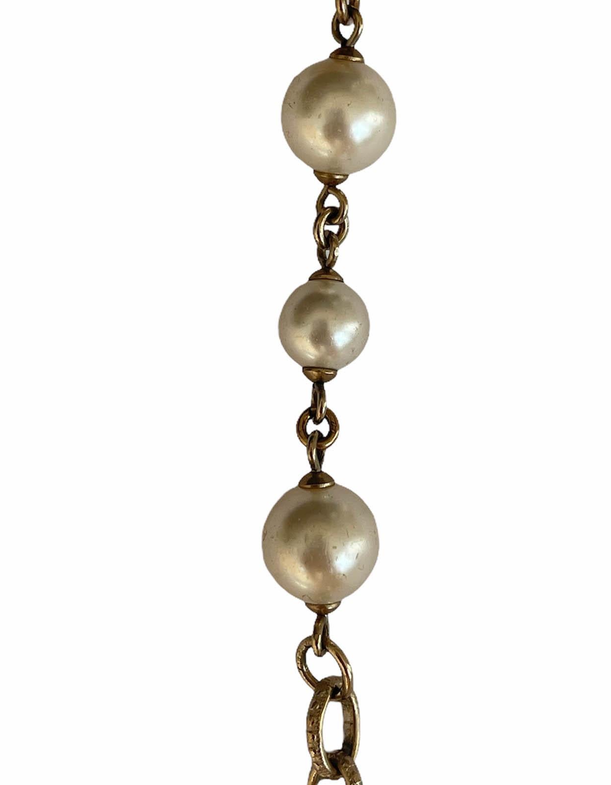 Women's Chanel Gold Camellia and Faux Pearl Bracelet For Sale