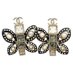 Chanel Gold CC Black White Dot Butterfly Pearl Piercing Earrings Chanel Gold CC Black White Dot Butterfly Pearl Piercing Earrings
