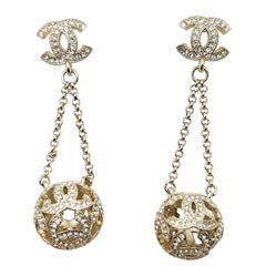 Orecchini da piercing Chanel Gold CC Crystal Ball Dangle