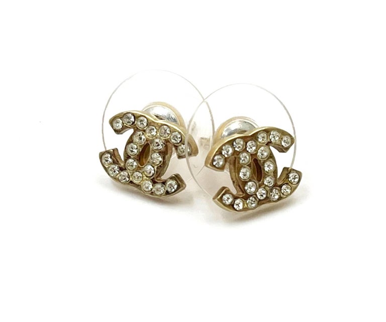 Chanel Gold CC Crystal Small Piercing Earrings at 1stDibs  chanel gold  stud earrings, piercing chanel, chanel earrings cc