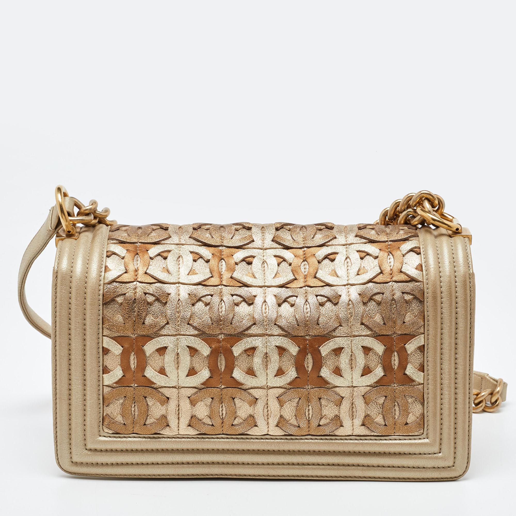 Carry everything you need in style thanks to this Chanel Gold Boy Flap Bag. Crafted from the best materials, this is an accessory that promises enduring style and usage.

