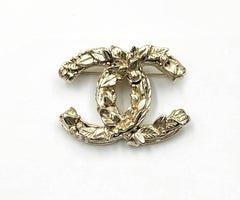 Broche Chanel Gold CC Golden Leaves