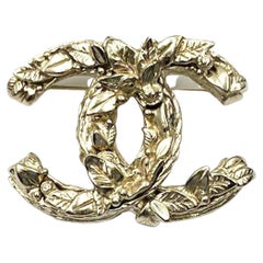 Gold Chanel Brooch - 515 For Sale on 1stDibs
